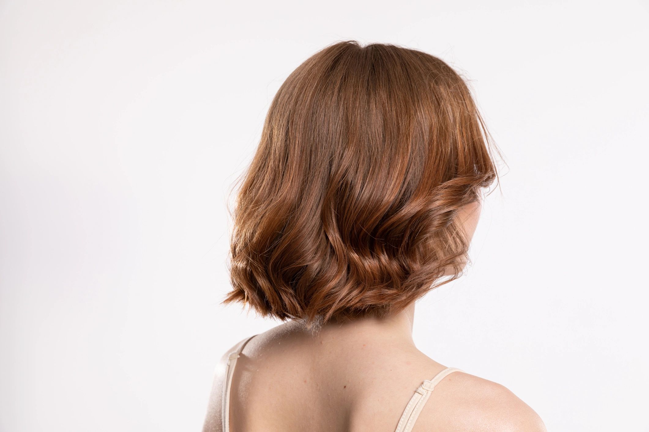 This trendy short hairstyle beautifully showcases soft waves.